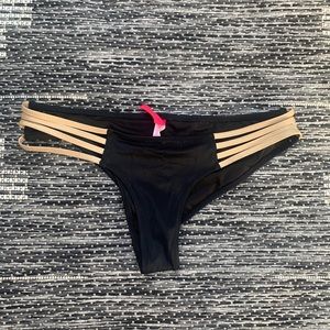 Victoria’s Secret black and gold bikini bottoms
